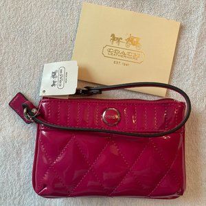 Coach  wallet with wrist strap, patent leather, magenta